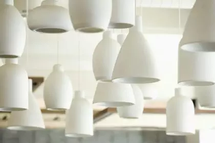White Lighting Fixtures, pendant lights of varying sizes and shapes